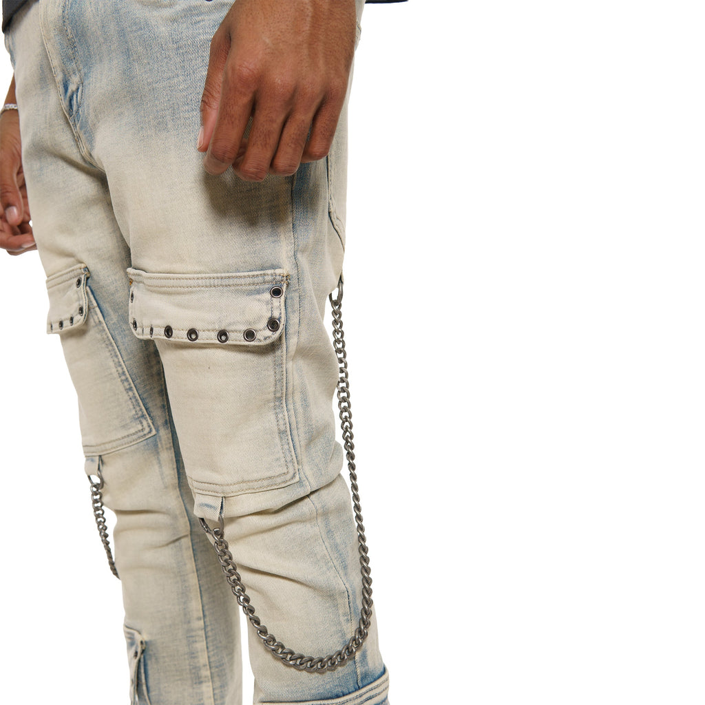 Flare fit denim pant w/ stone details + chains