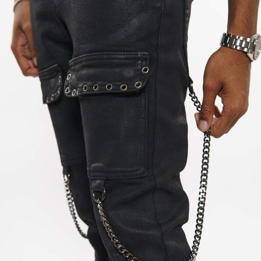 Wax coated cargo flare denim pant with side chains