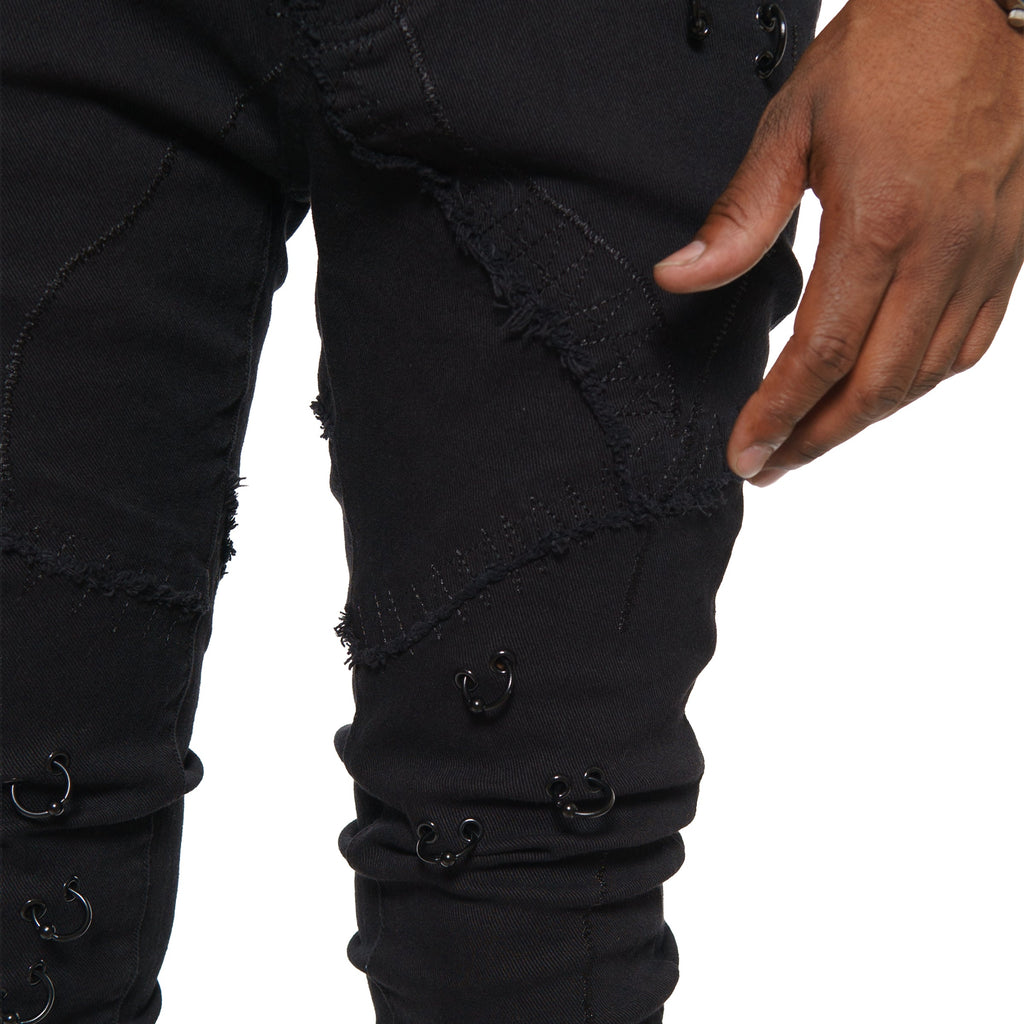 Rip & repair flare denim pant w/ metal ring details