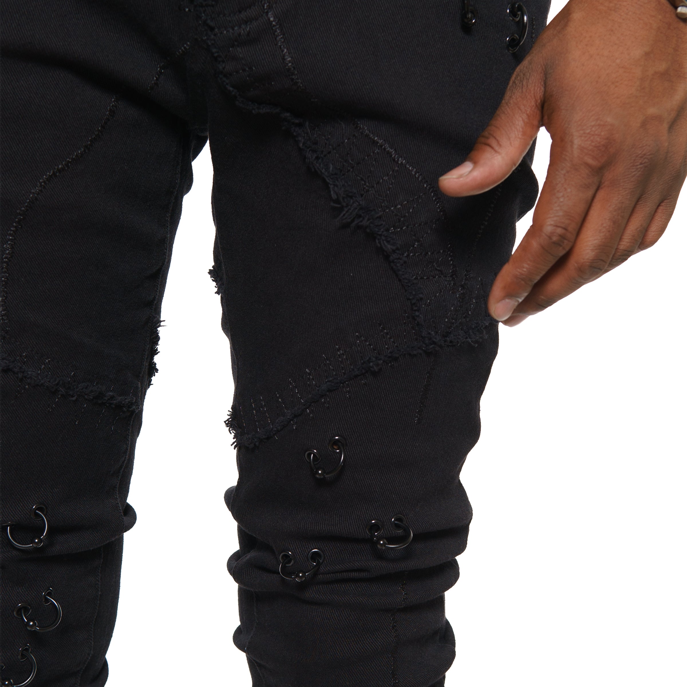 Rip & repair flare denim pant w/ metal ring details